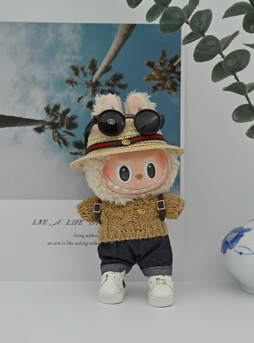 Gucci brown sweater and jeans
