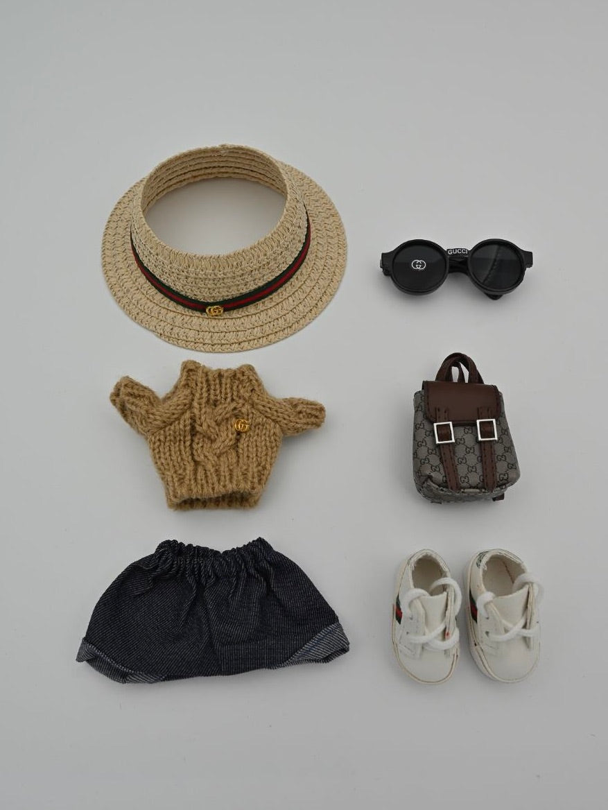 Gucci brown sweater and jeans