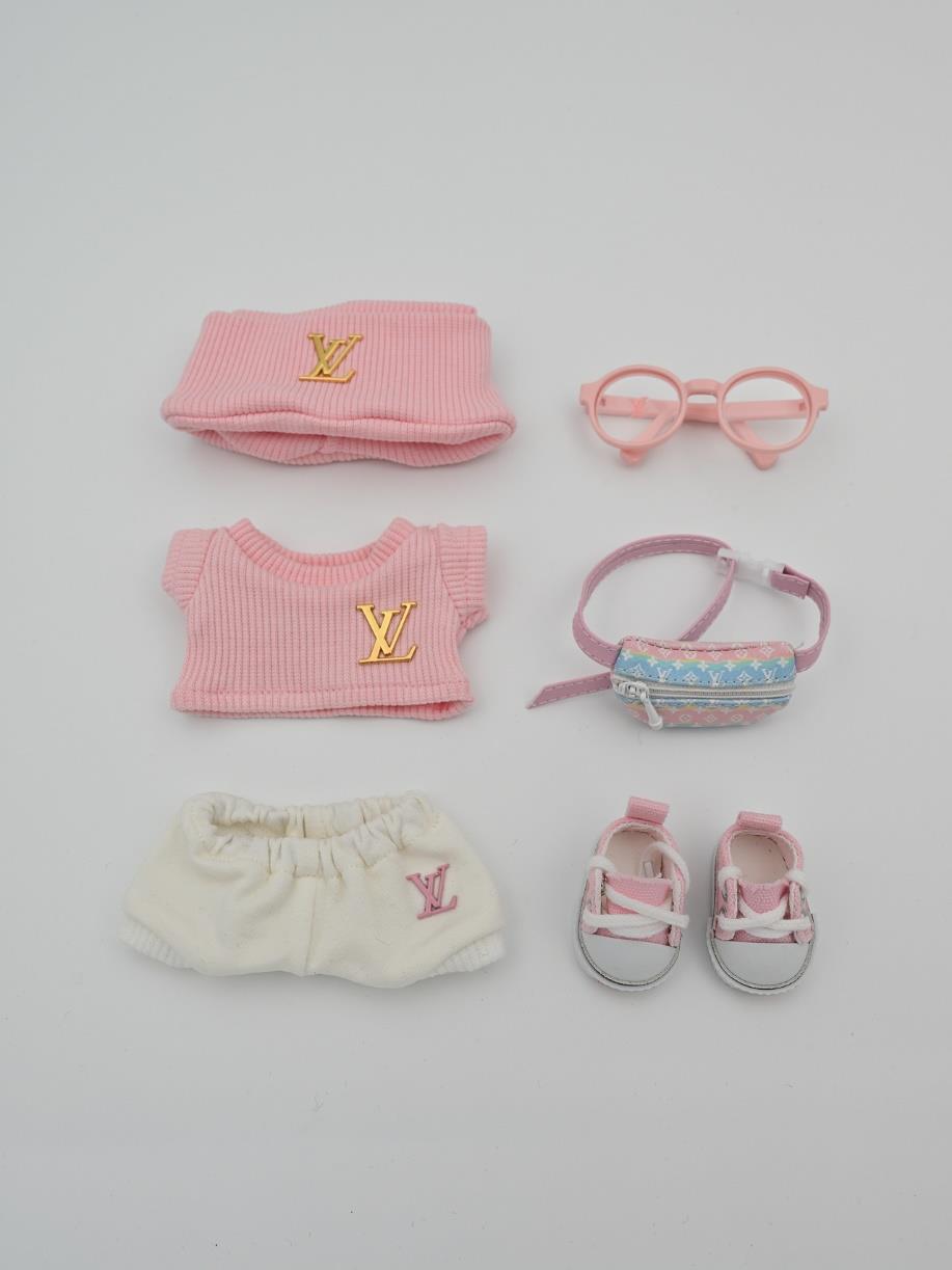 Louis Vuitton pink ensemble and multicolor fanny pack