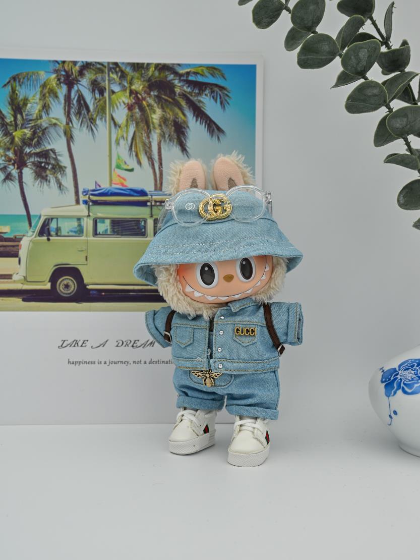 Gucci light denim ensemble and backpack