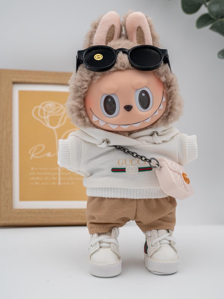 Gucci white hoodie ensemble with marmont bag.