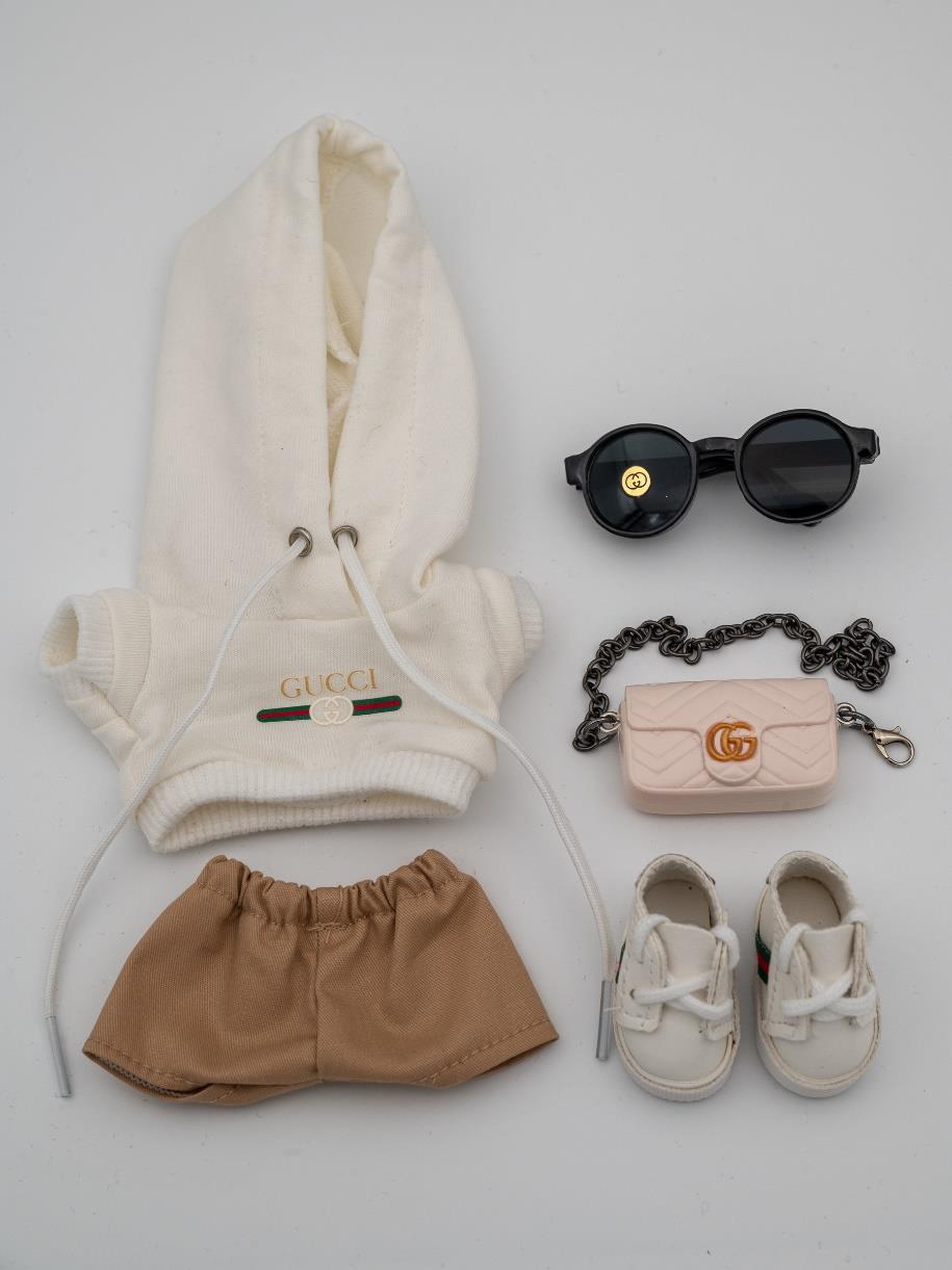 Gucci white hoodie ensemble with marmont bag.