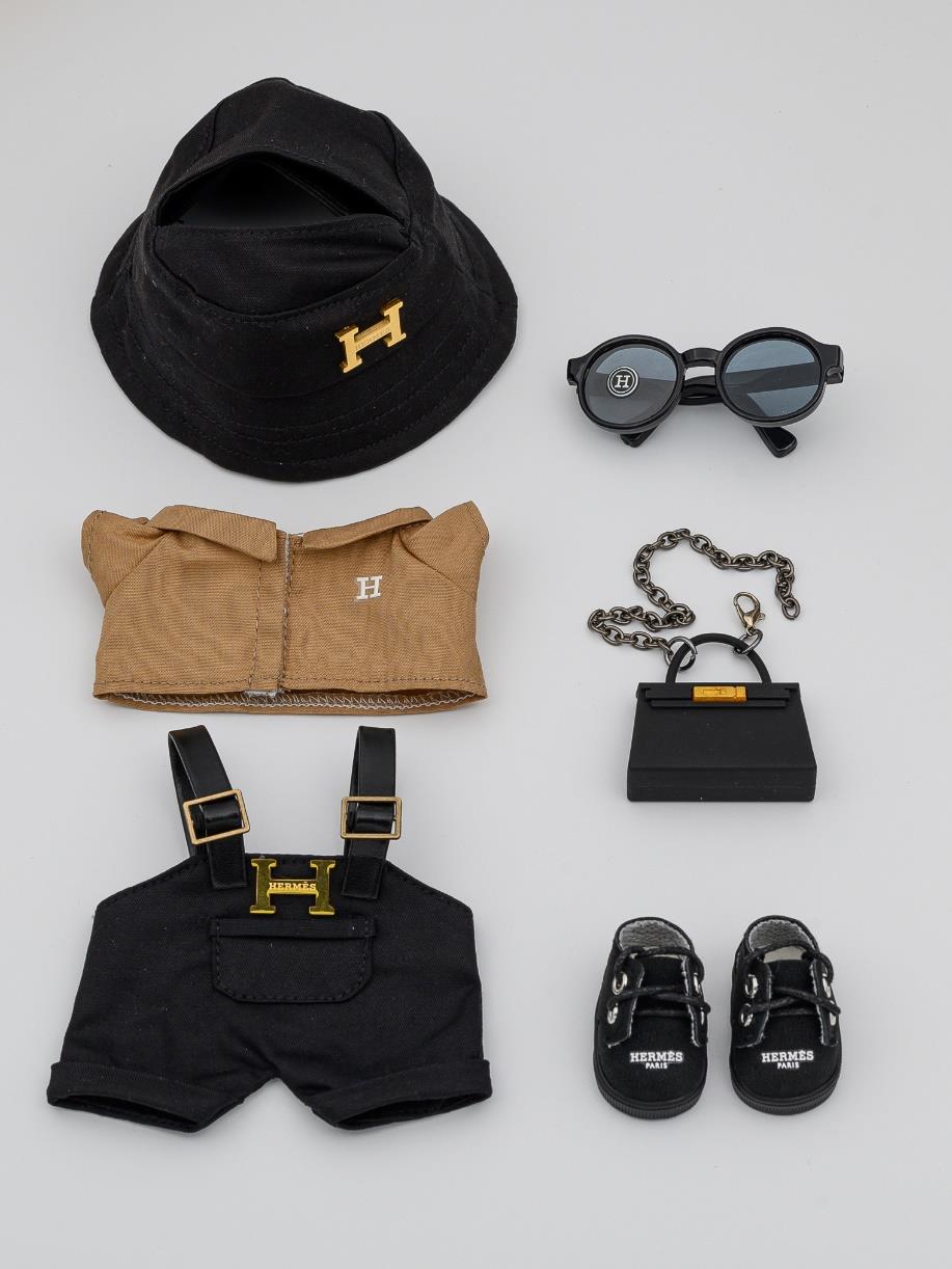 Hermes black ensemble with Kelly