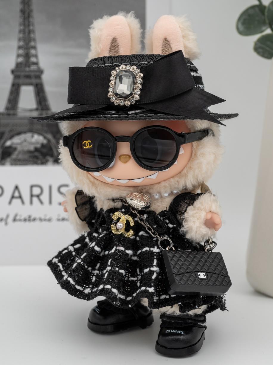 Chanel tweed dress and jeweled hat