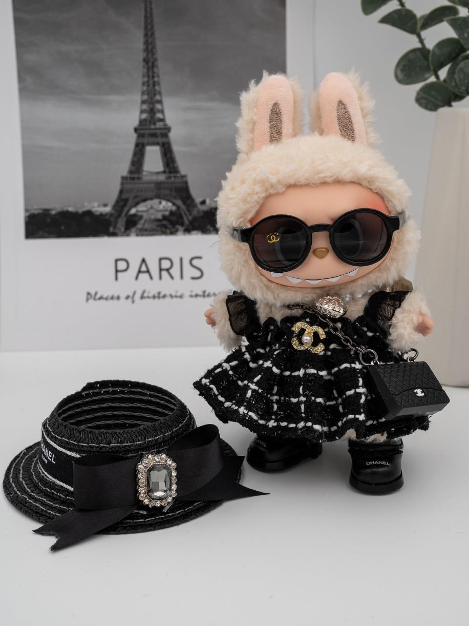 Chanel tweed dress and jeweled hat