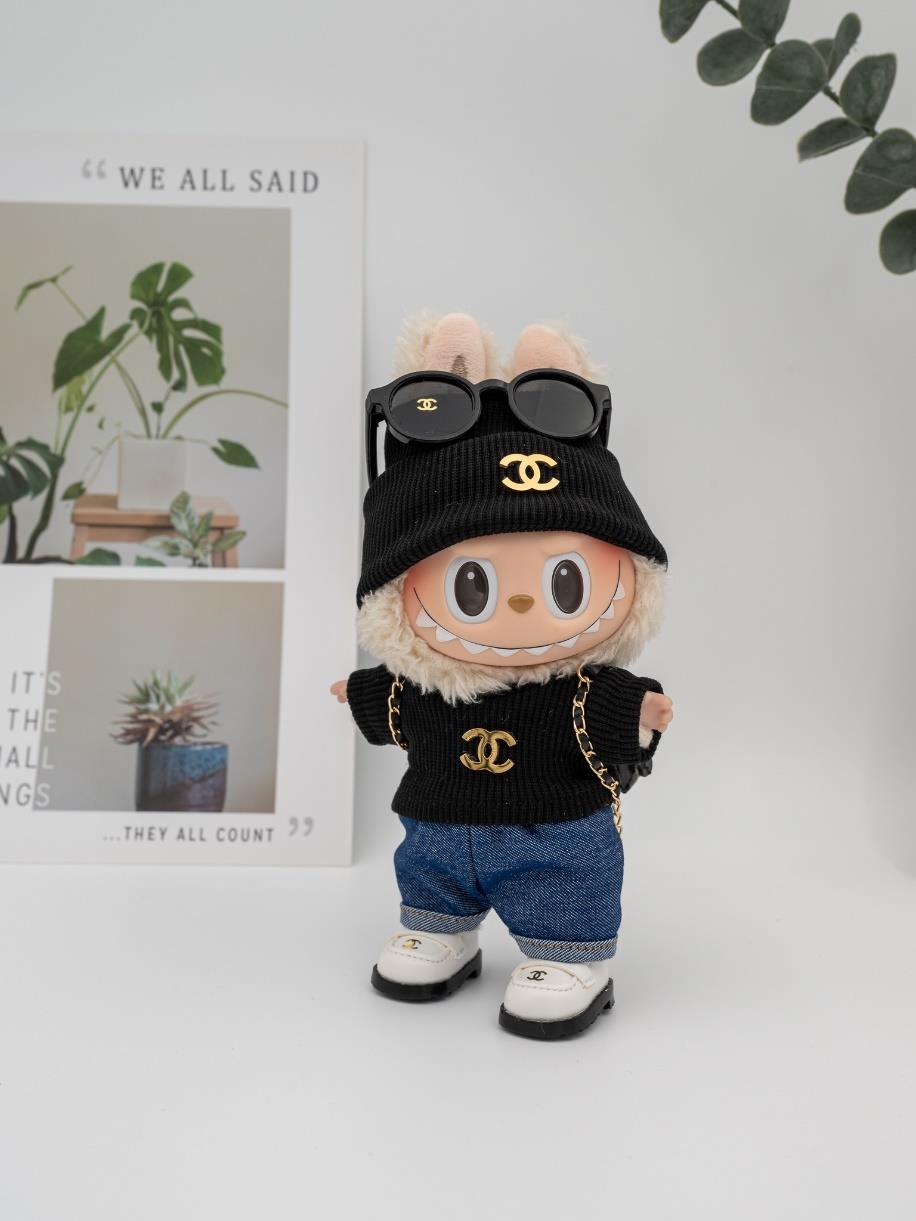 Chanel black sweater backpack ensemble