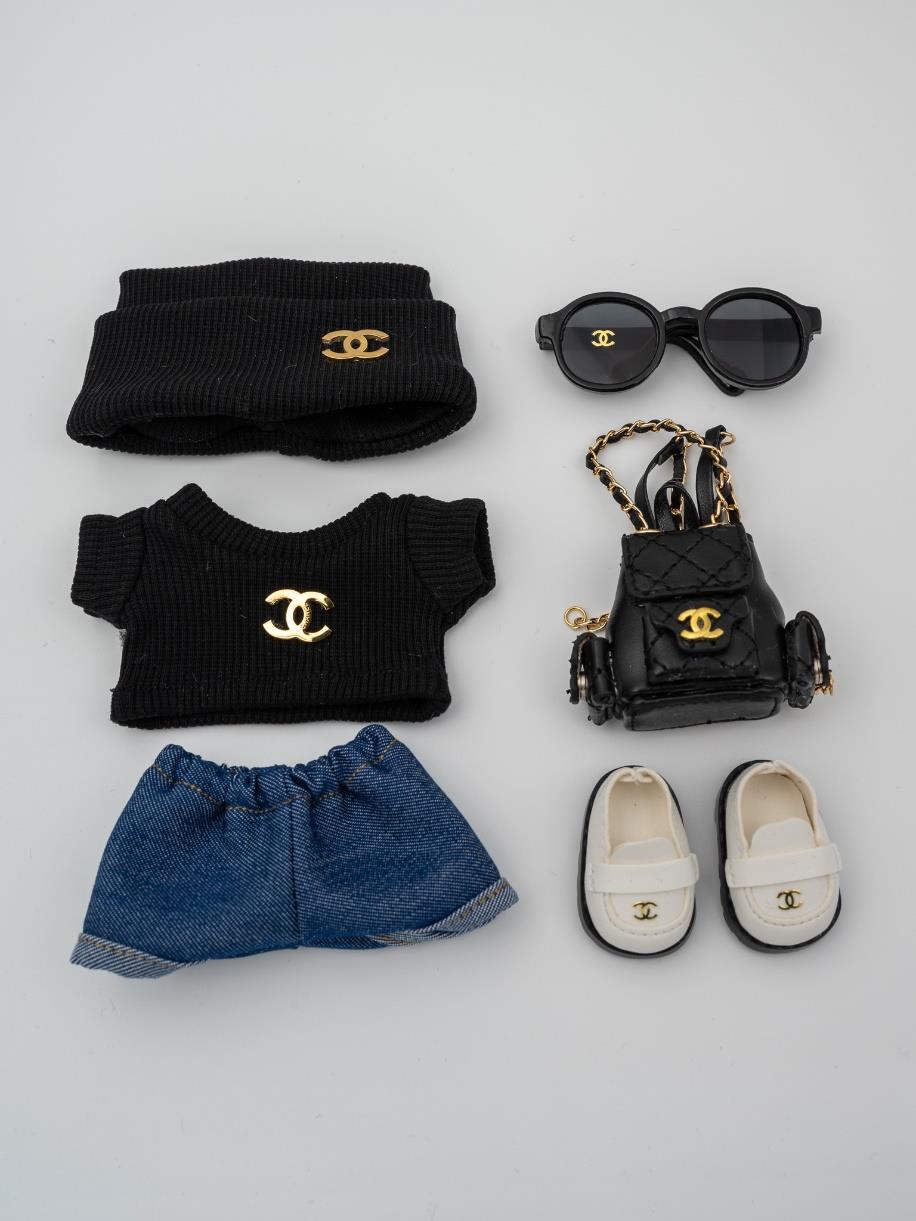 Chanel black sweater backpack ensemble