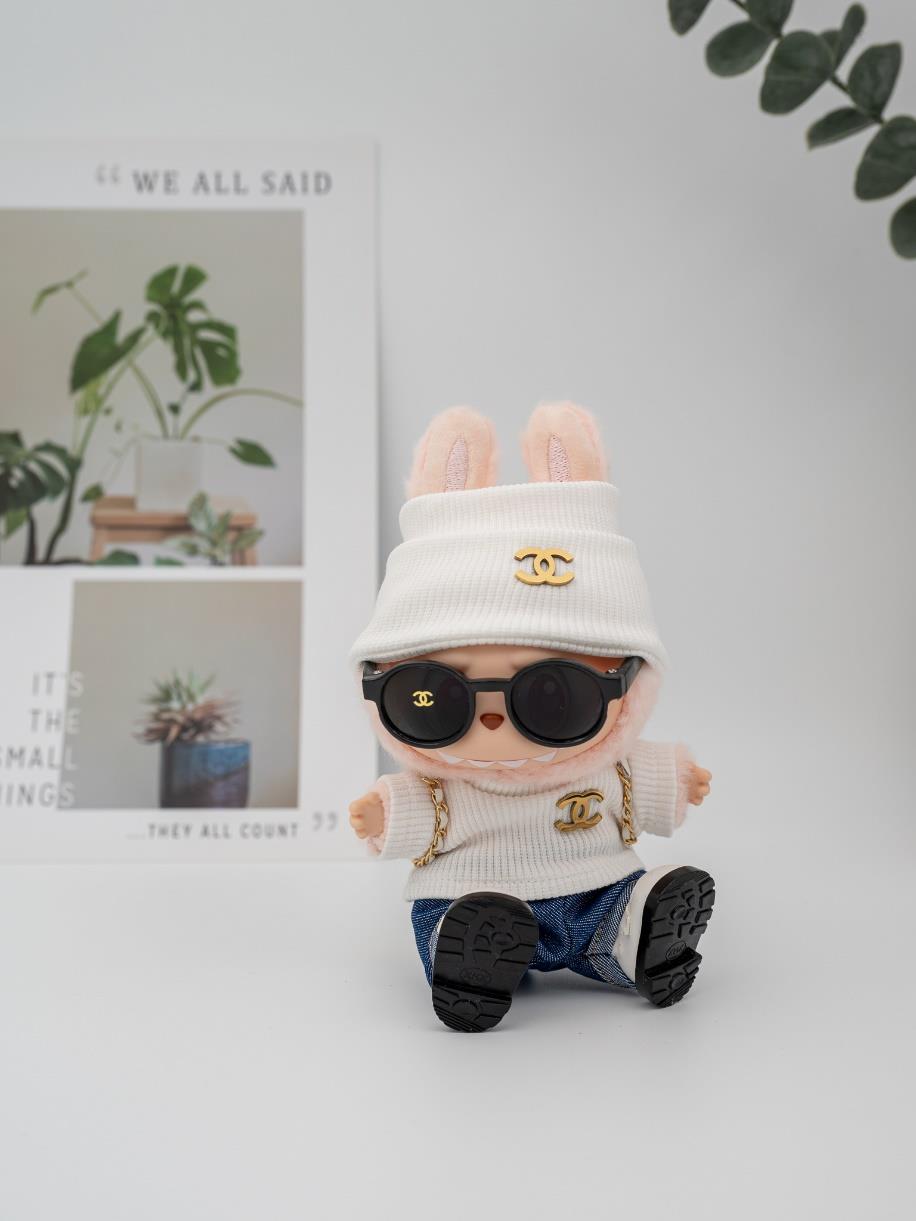 Chanel white sweater backpack ensemble