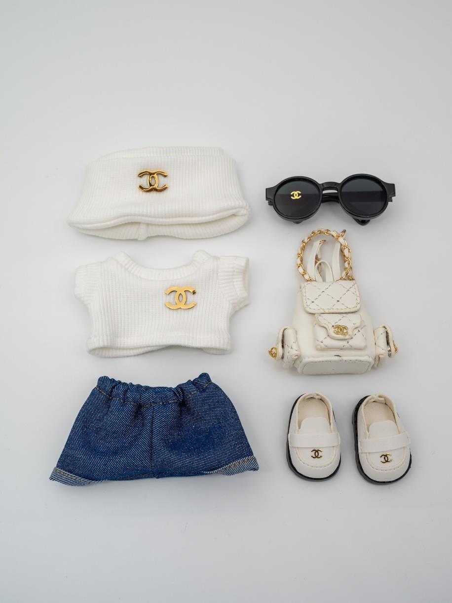 Chanel white sweater backpack ensemble