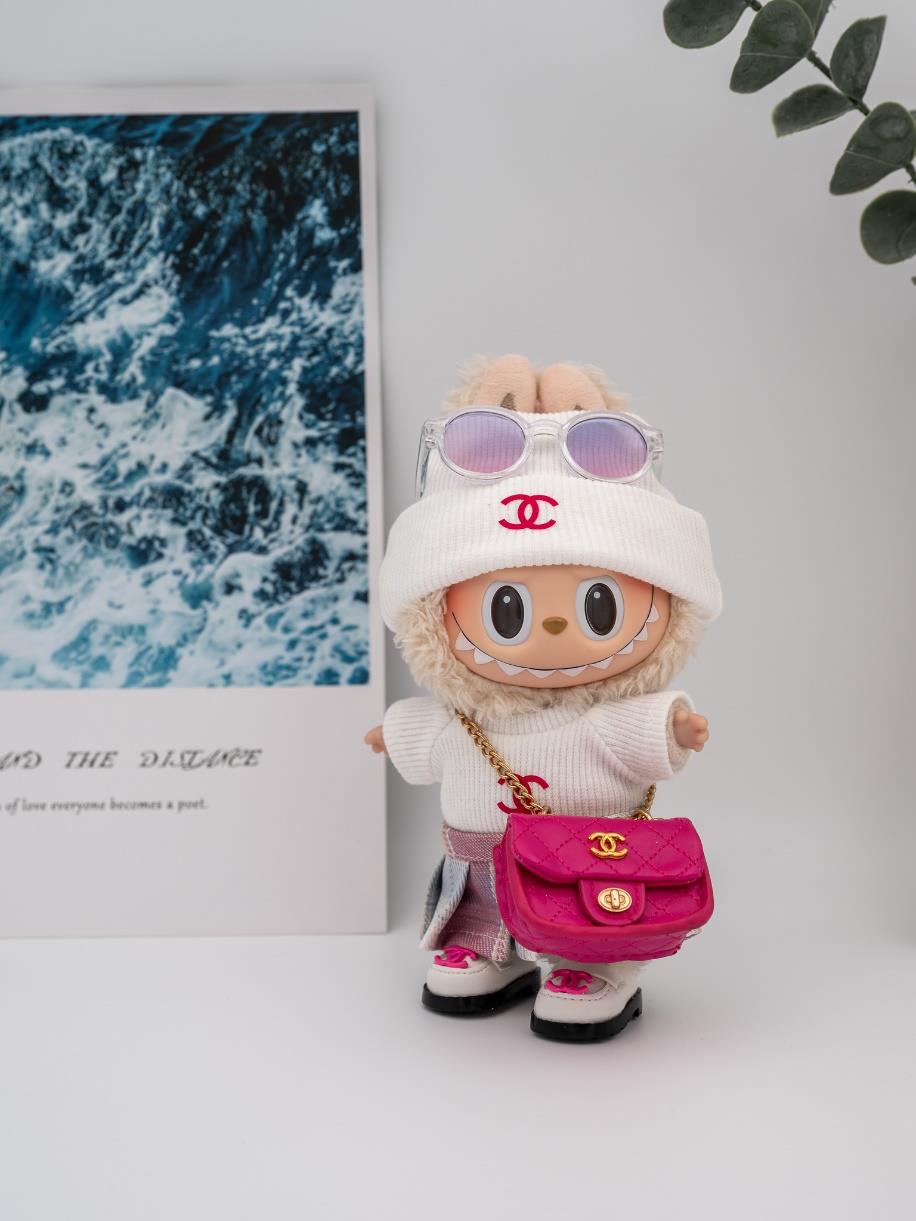 Chanel white ensemble with pink fuscia bag