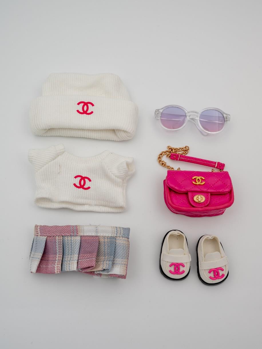 Chanel white ensemble with pink fuscia bag