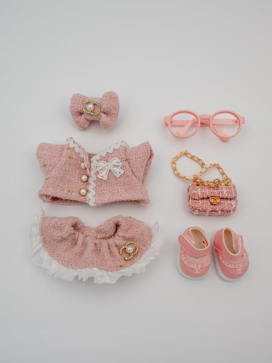 Chanel pink tweed jacket with pearl buttons ensemble