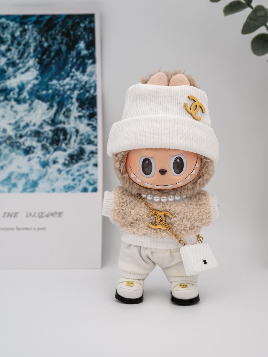 Chanel furry beige fur and white sweater ensemble